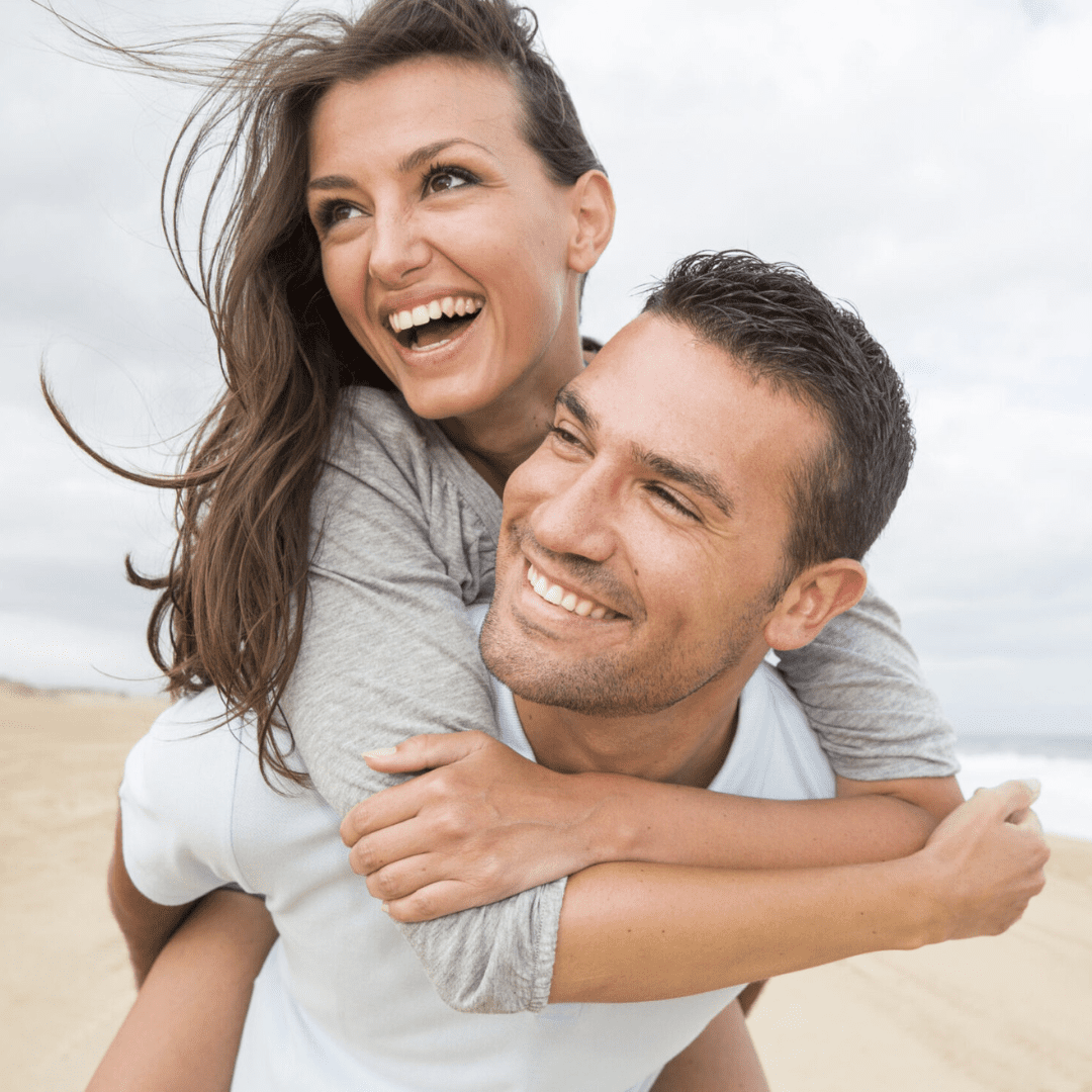 Youthful couple enjoying their best life after visiting Encompass Wellness & Aesthetics