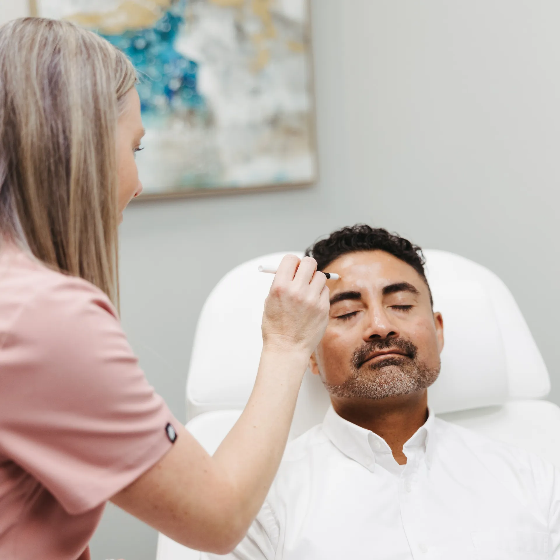 An Encompass Wellness & Aesthetics customer being prepped for injectables treatment.