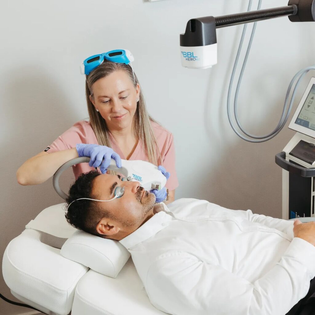 An Encompass Wellness & Aesthetics customer receiving Forever Young BBL Anti-Aging treatment.