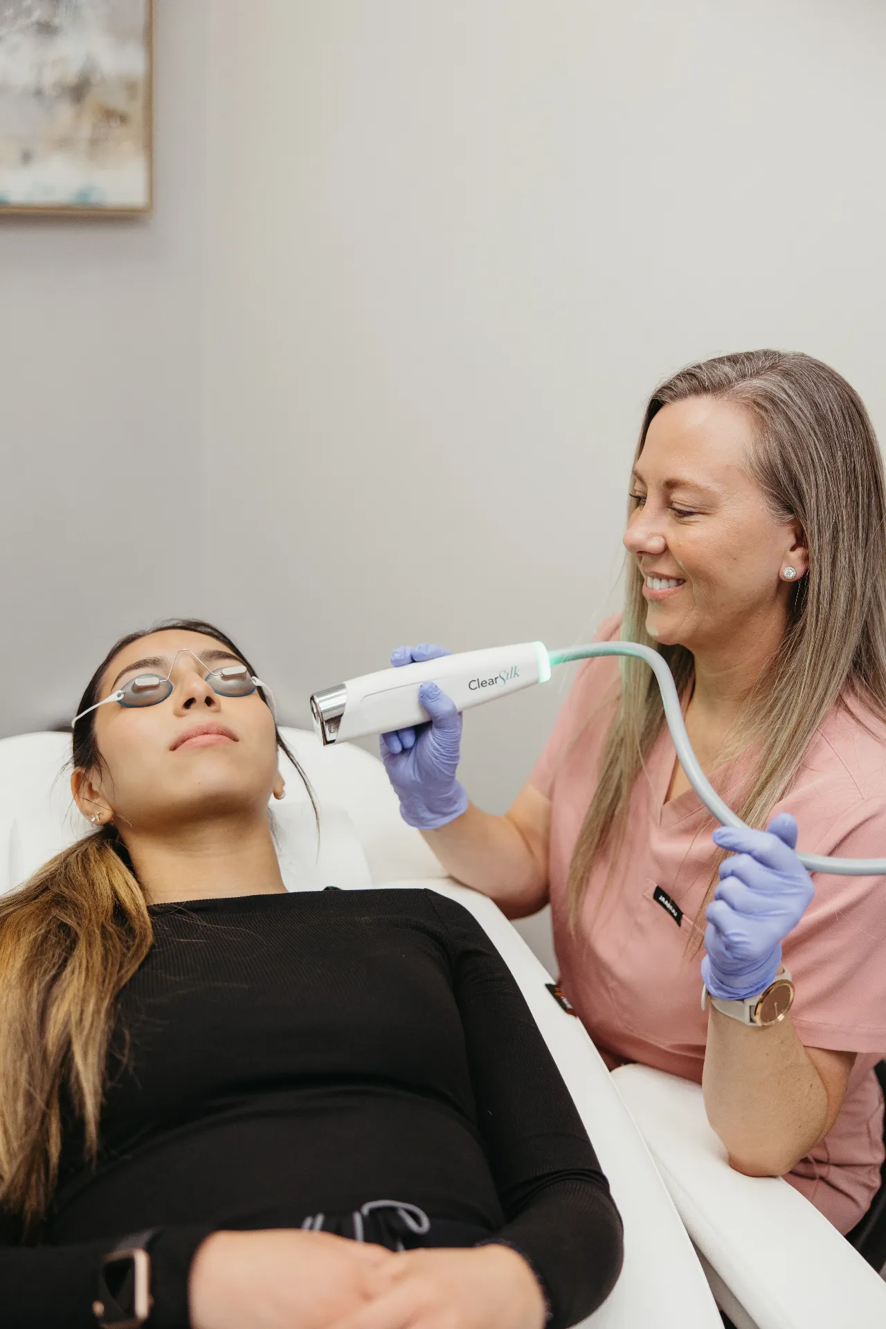 An Encompass Wellness & Aesthetics customer receiving an aesthetics ClearSilk treatment.