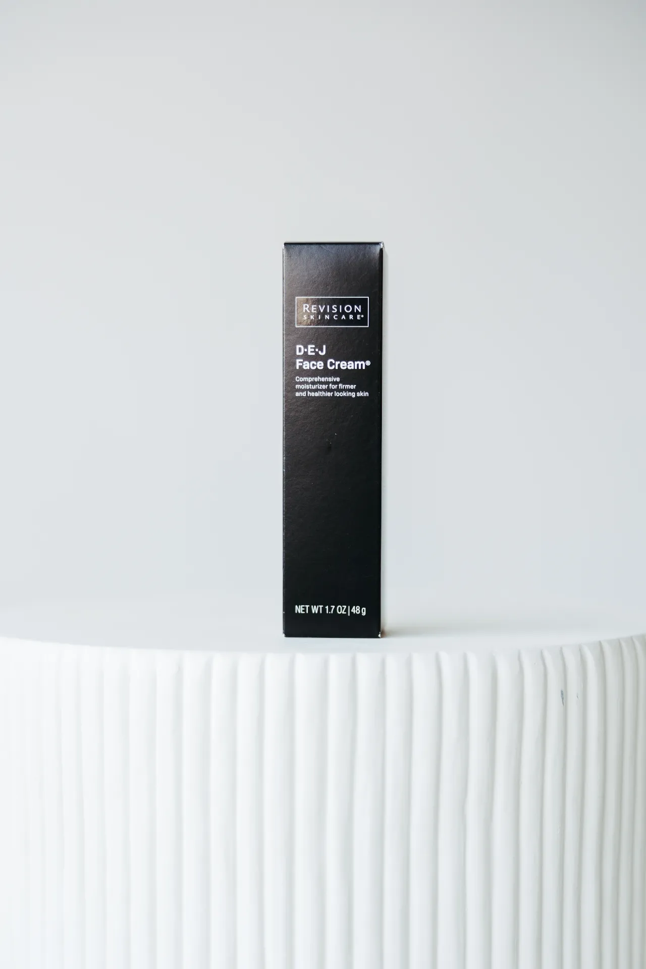 Revision Skincare's DEJ Face Cream product sold at Encompass Wellness & Aesthetics