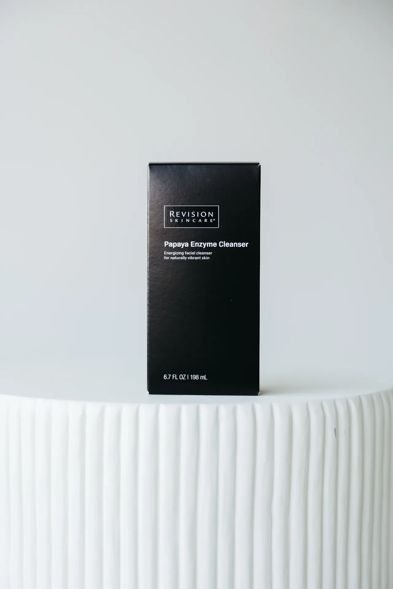 Revision Skincare's Papaya Enzyme Cleanser product sold at Encompass Wellness & Aesthetics