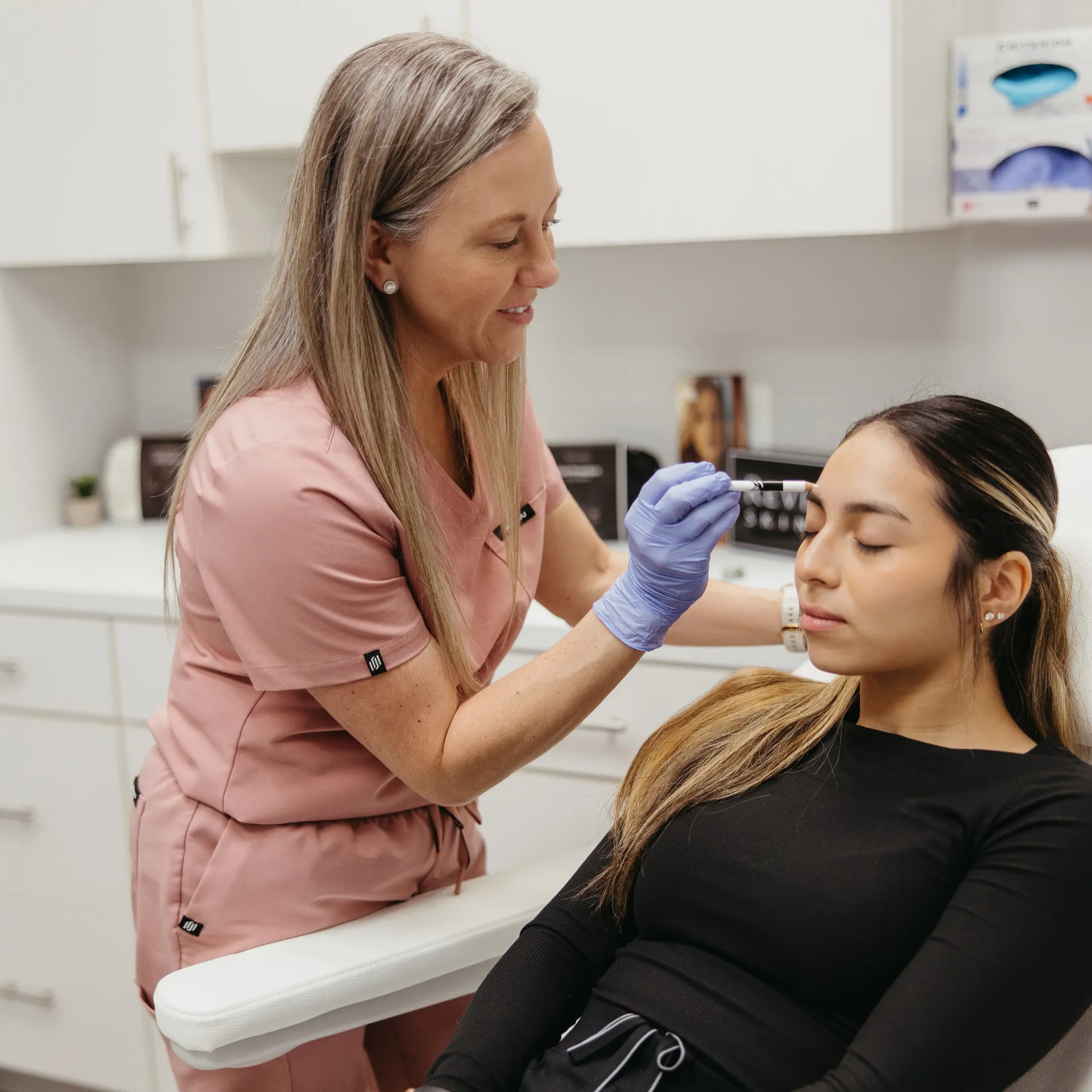 An Encompass Wellness & Aesthetics customer being prepped for injectables treatment.