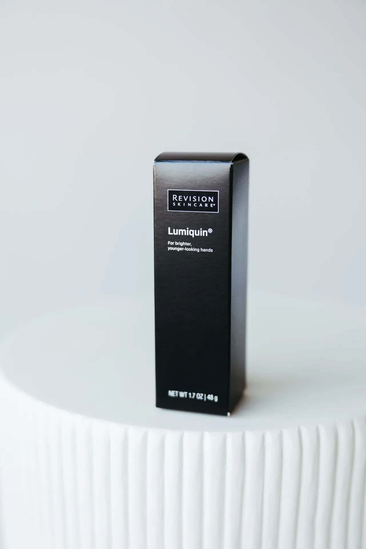 Revision Skincare's Lumiquin product sold at Encompass Wellness & Aesthetics