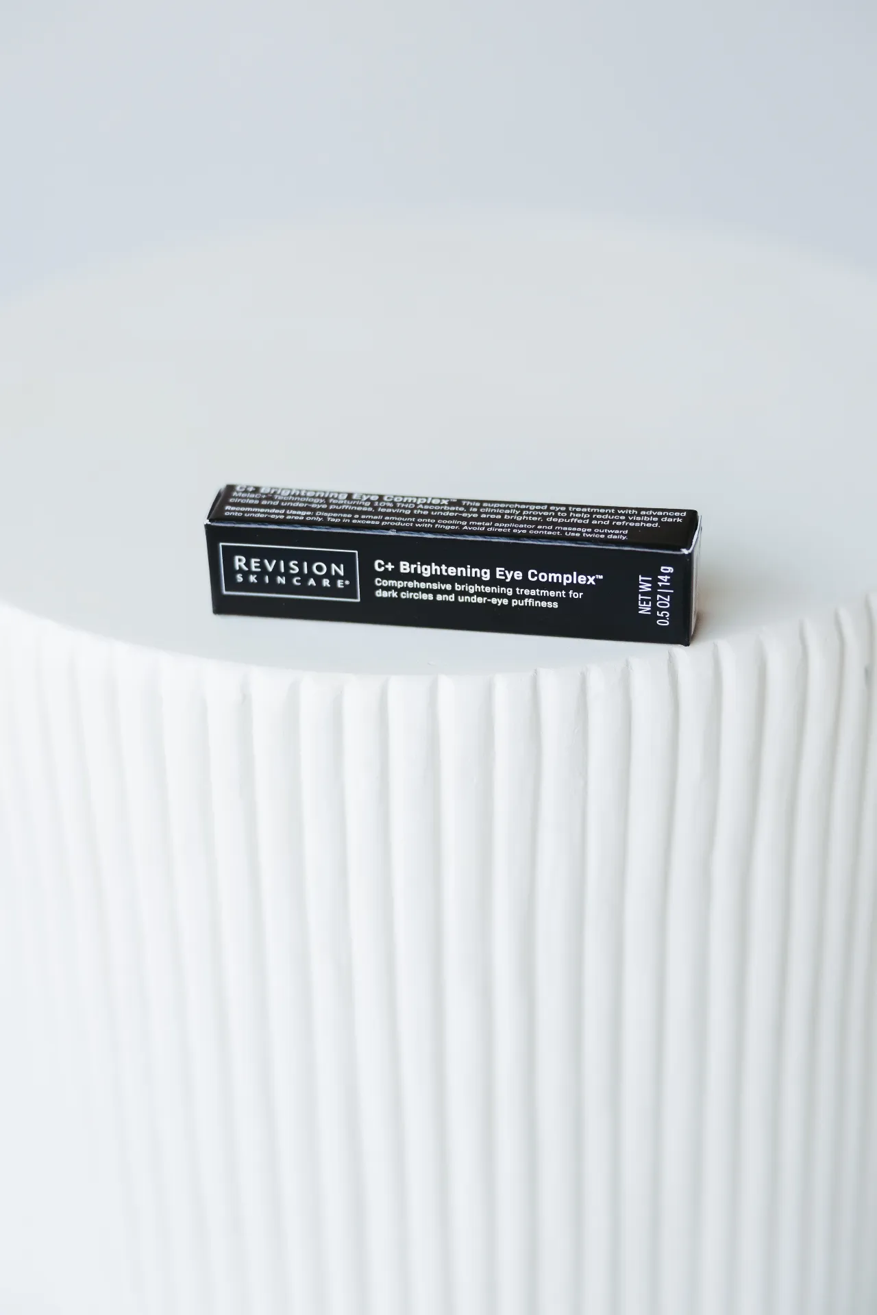 Revision Skincare's C+ Brightening Eye Complex product sold at Encompass Wellness & Aesthetics