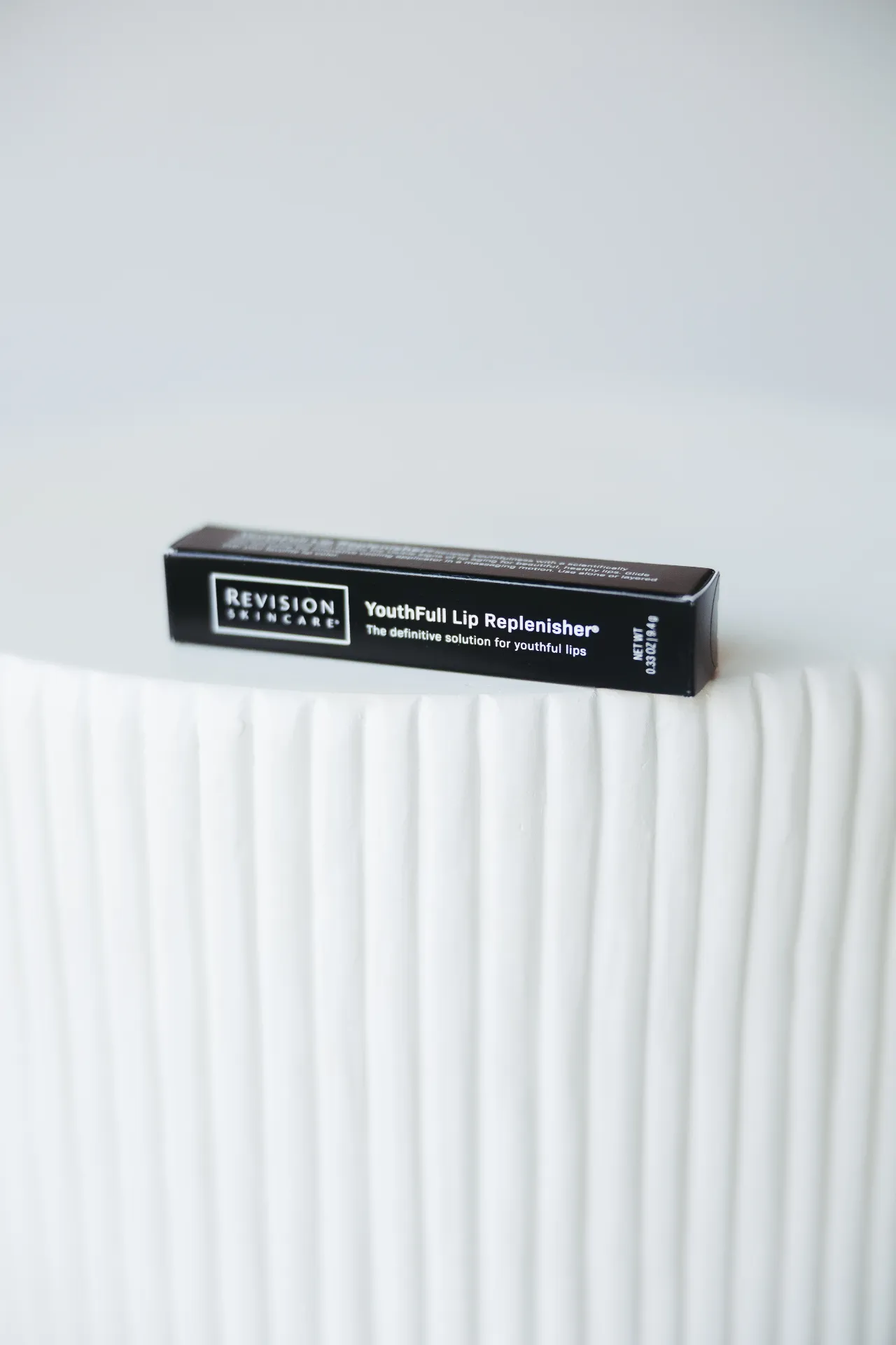 Revision Skincare's YouthFull Lipa Replenisher product sold at Encompass Wellness & Aesthetics