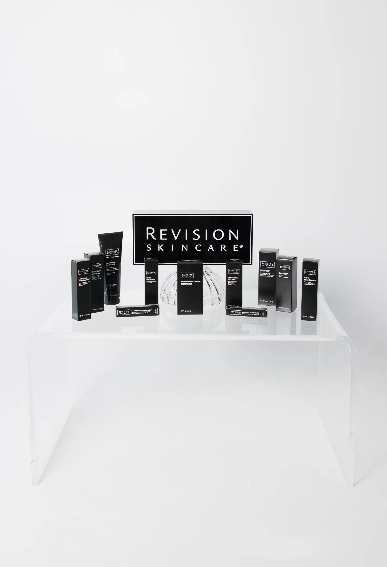 Revision Skincare products sold at the Encompass Wellness & Aesthetics shop.