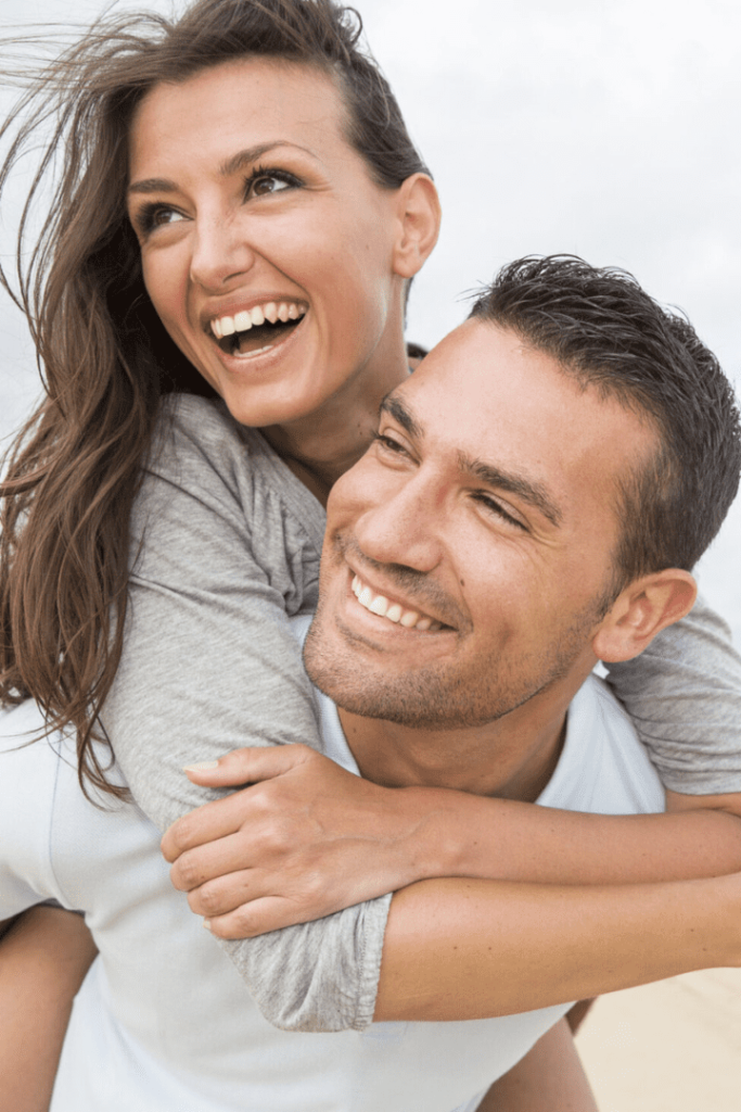 Youthful couple enjoying their best life after visiting Encompass Wellness & Aesthetics