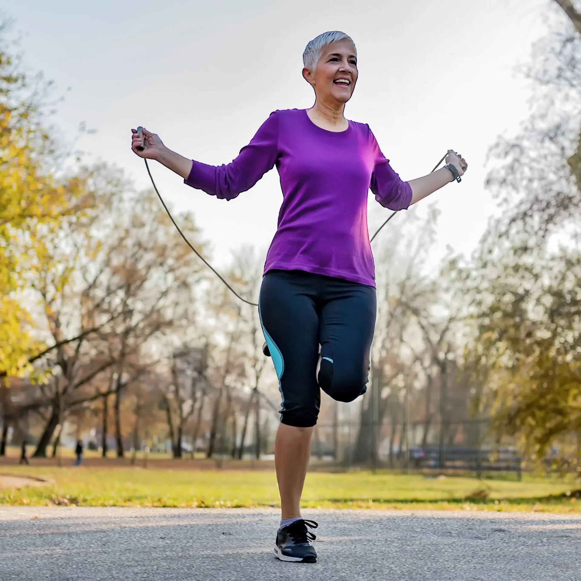 Woman jump roping after getting early detection screening at Encompass Wellness & Aesthetics