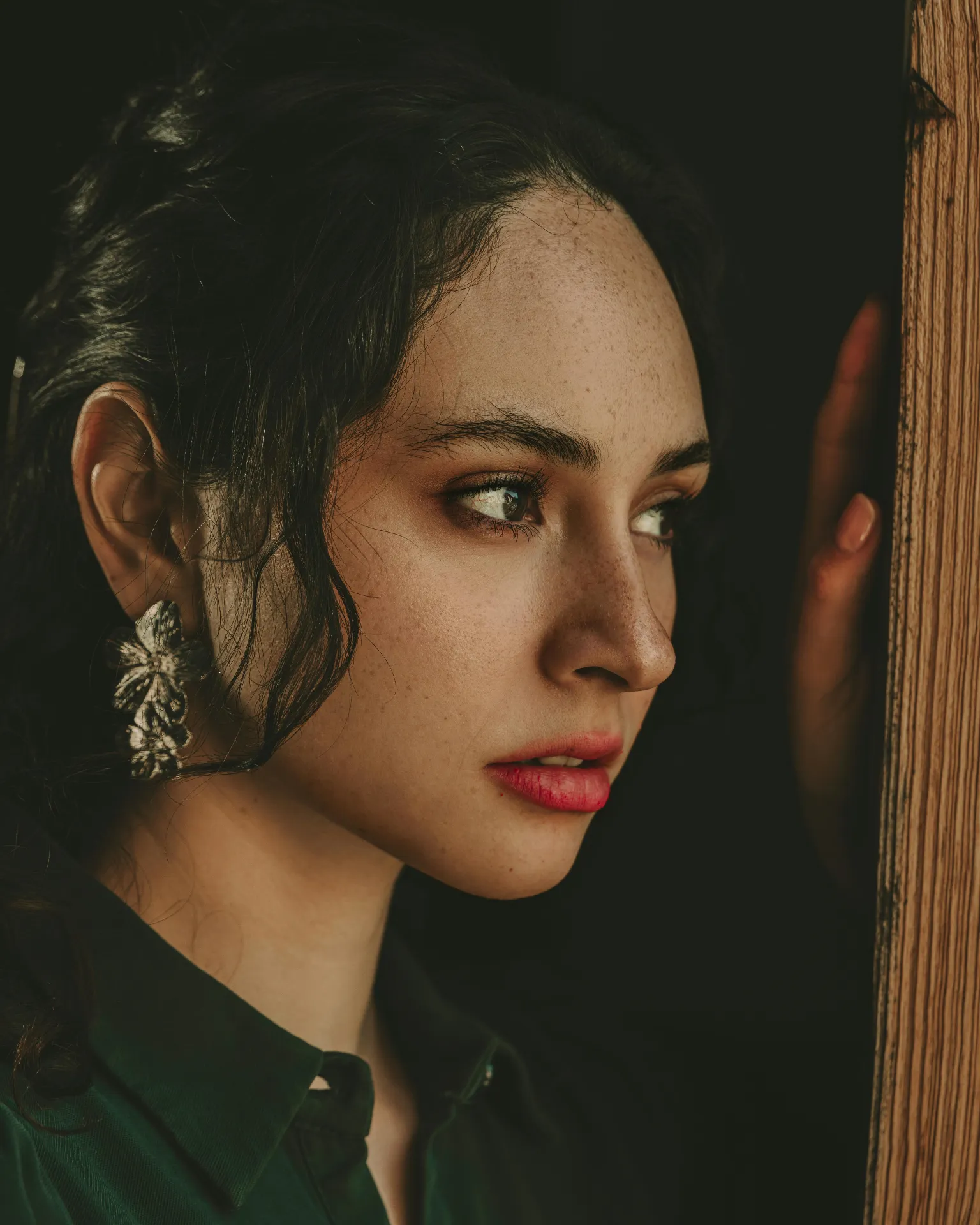 Woman with calm, confident expression reflecting on her intimate wellness and O-Shot treatment journey