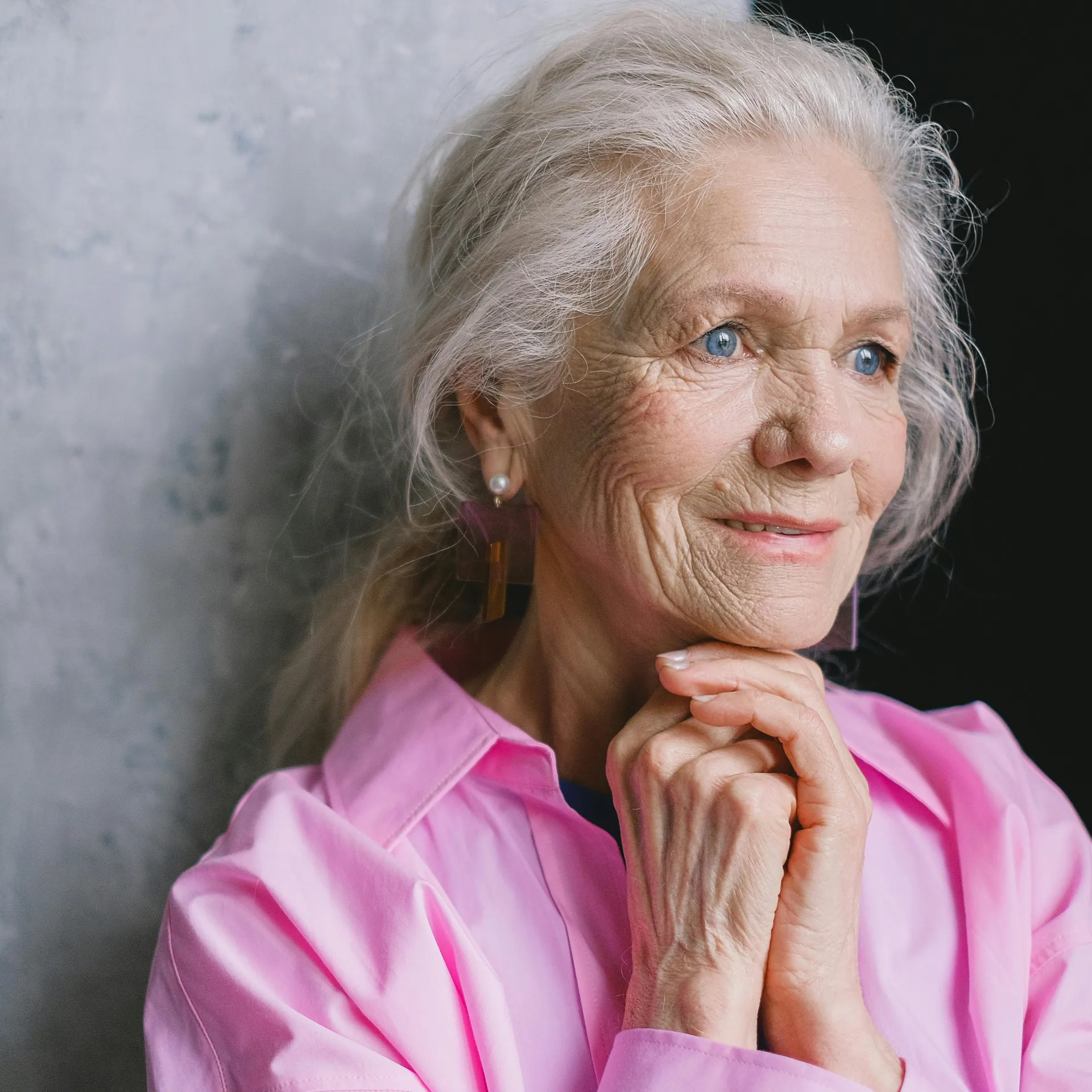 Smiling older adult woman representing patients who may consider Early Cancer Screening.